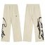 Cream Graphic Straight-Leg Sweatpants | Minimalist Streetwear Pants with Bold Side Print Detail