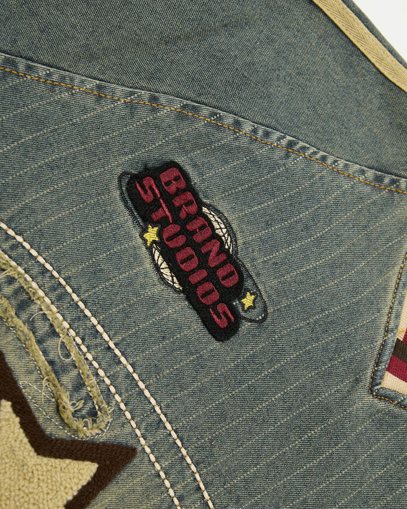 Distressed denim short-sleeved shirt with appliqué