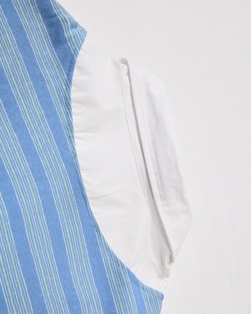 Faux two-piece polo shirt with spliced long sleeves