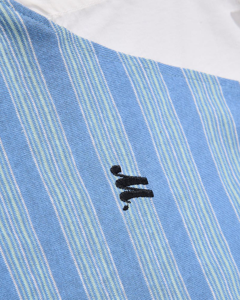 Faux two-piece polo shirt with spliced long sleeves