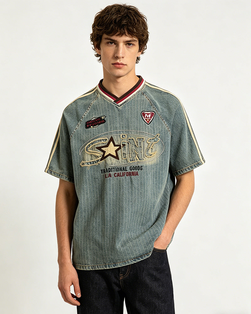 Distressed denim short-sleeved shirt with appliqué