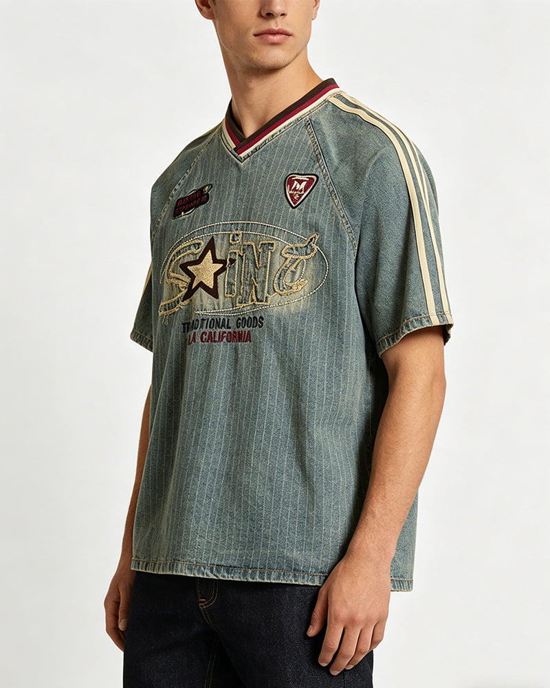 Distressed denim short-sleeved shirt with appliqué