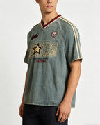 Distressed denim short-sleeved shirt with appliqué