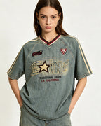 Distressed denim short-sleeved shirt with appliqué