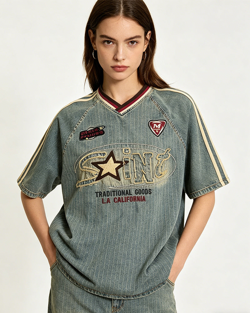 Distressed denim short-sleeved shirt with appliqué