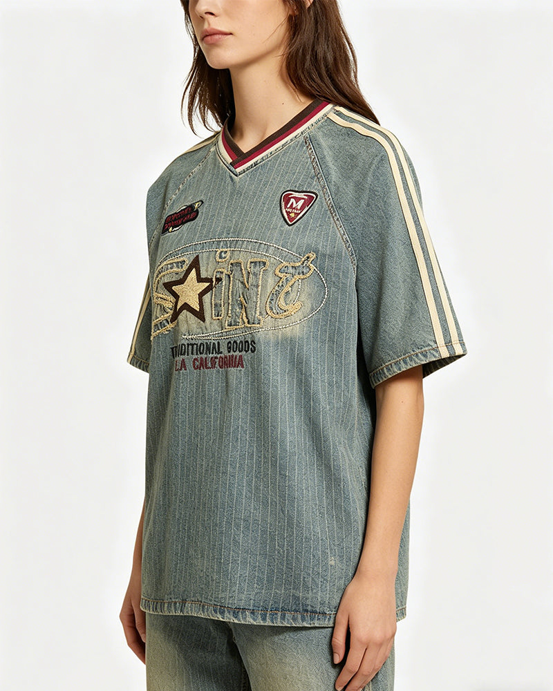 Distressed denim short-sleeved shirt with appliqué