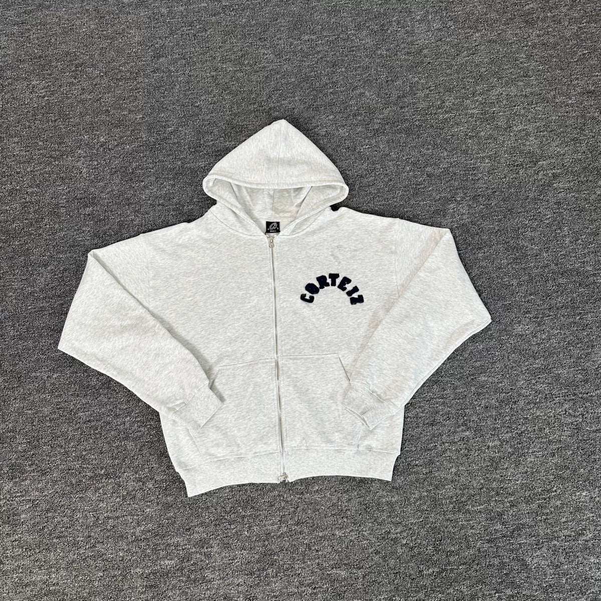 White Zip-Up Hoodie | Minimalist Streetwear Hoodie with Curved Logo Detail